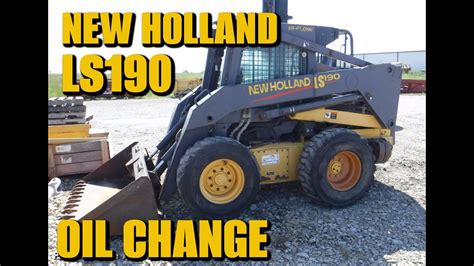 changing oil in a skid steer|oil change new holland skid steer.